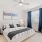 Bedroom with large windows