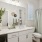 bright bathroom with white cabinets