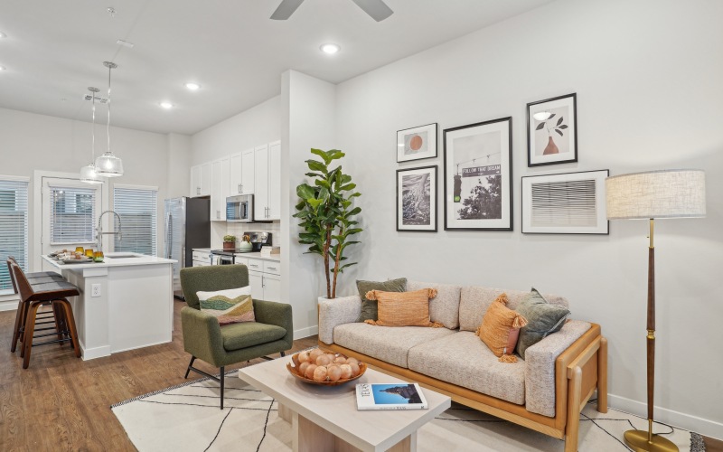 Spacious living room with hardwood style floor and open concept