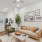 large living room with large windows and hardwood style floor